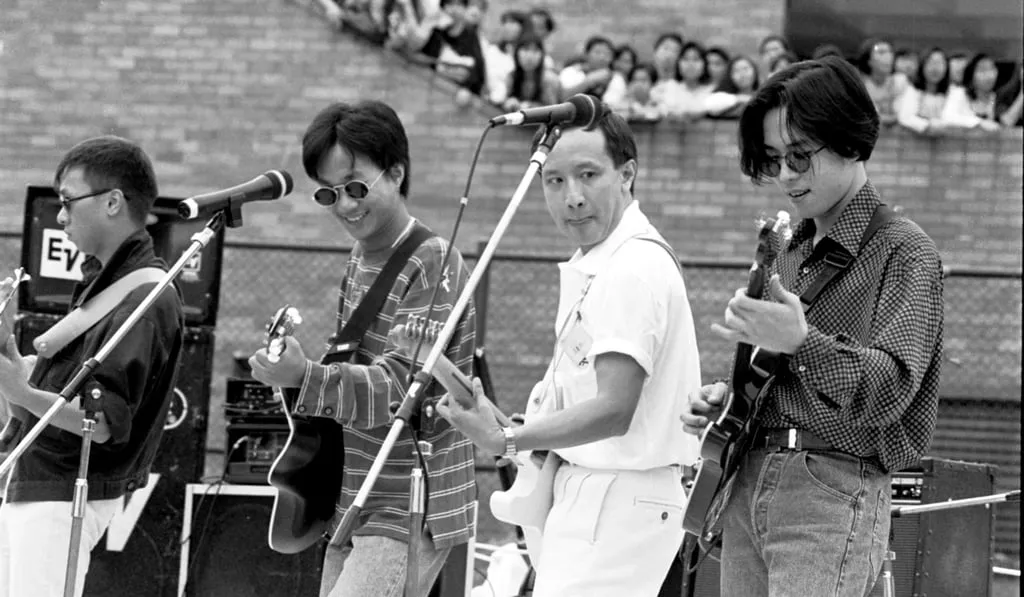 Deputy secretary for health and welfare Ricky Fung (second from right) with members of pop band Beyond. From left: Wong Ka-keung, Wong Ka-kui and Wong Koon-chung at Hong Kong Polytechnic, in 1991.