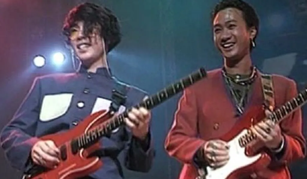 Wong Ka-kui playing his red and white Fender Stratocaster, with which he was most closely associated.